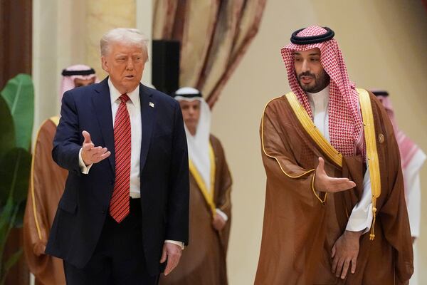 President Donald Trump arrives with Saudi Crown Prince Mohammed bin Salman for the group photo with Gulf Cooperation Council leaders during the GCC Summit in Riyadh, Saudi Arabia, Wednesday, May 14, 2025. (AP Photo/Alex Brandon)