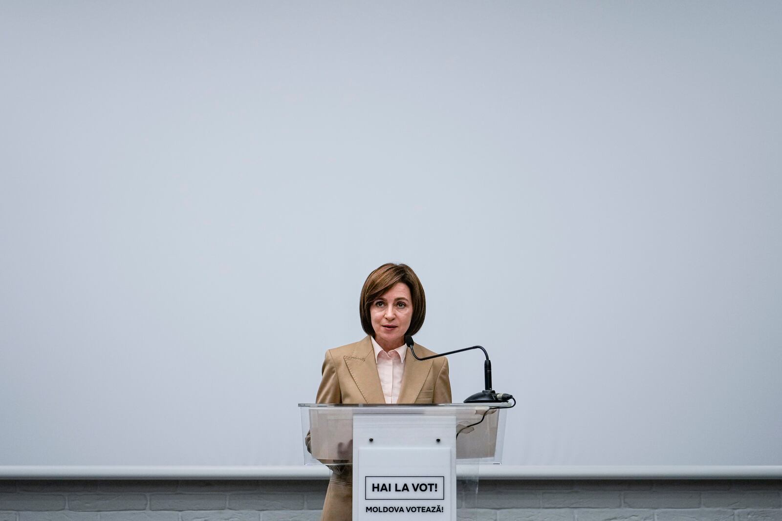 Moldova's President Maia Sandu speaks to the media during a press briefing after the polls closed for the presidential election and the referendum on whether to enshrine in the Constitution the country's path to European Union membership, in Chisinau, Moldova, early Monday, Oct. 21, 2024. (AP Photo/Vadim Ghirda)