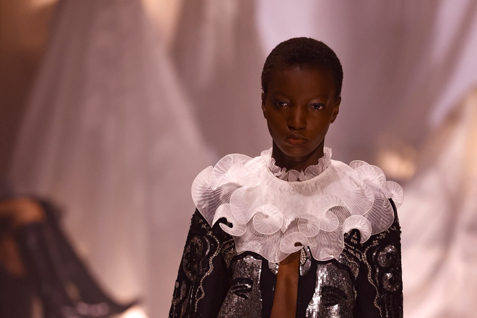 A model wears a creation as part of the Valentino Spring/Summer 2025 collection presented Sunday, Sept. 29, 2024 in Paris. (Photo by Vianney Le Caer/Invision/AP)