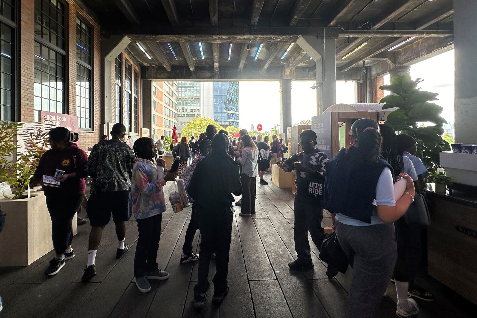 People look at exhibits at the Climate Science Fair, an outdoor exhibit hosted by the Emerson Collective during the annual Climate Week NYC and United Nations General Assembly, on Monday, Sept. 23, 2024 in New York. (AP Photo/Peter Morgan)