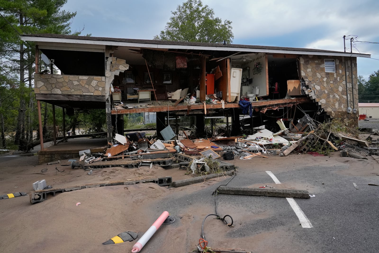 A flood damaged building left by tropical depression Helene is seen in Newport, Tenn., Saturday, Sept. 28, 2024. (AP Photo/George Walker IV)