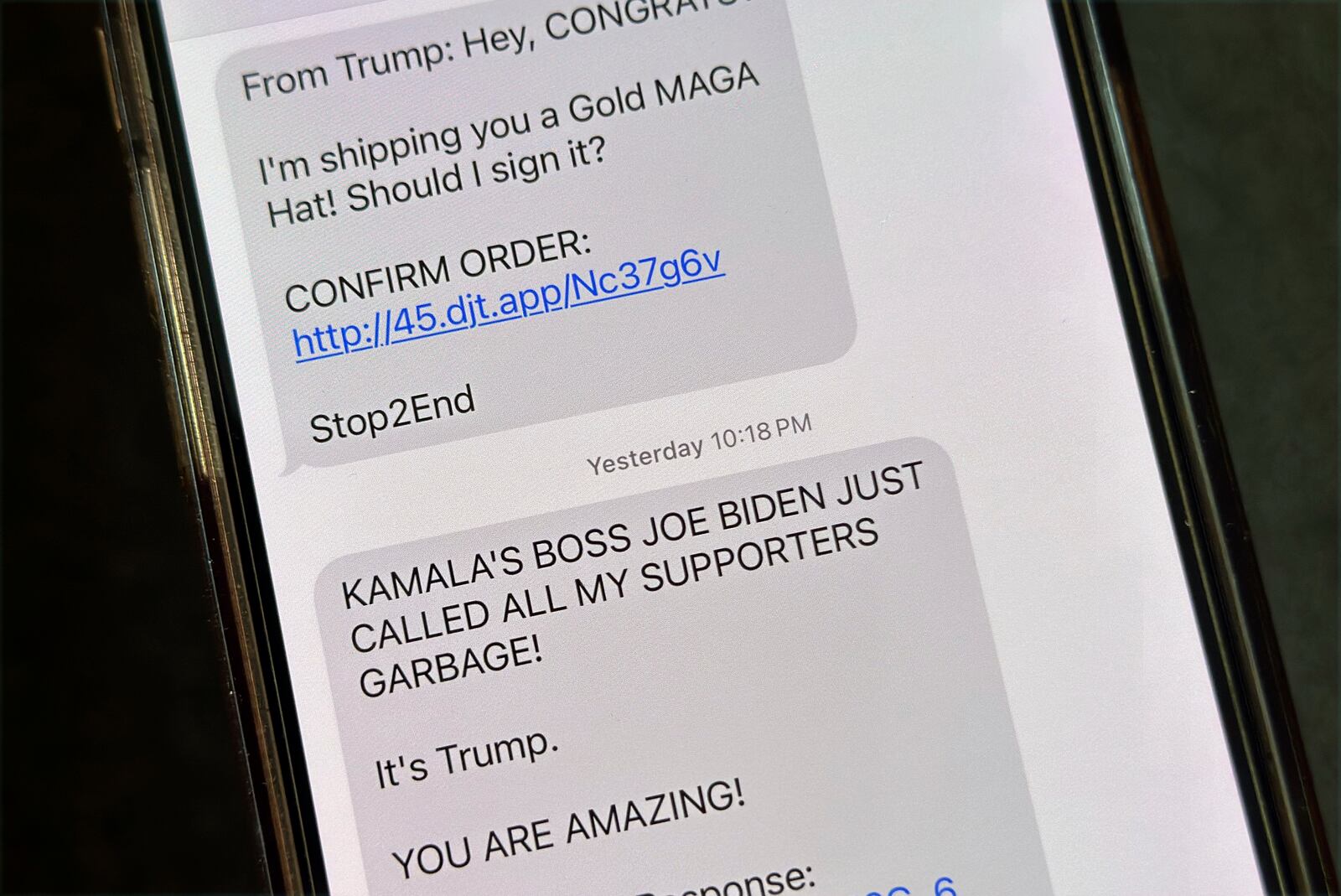 A text is viewed on a mobile device Wednesday, Oct. 30, 2024, in Washington, as across the U.S., people's phones are pinging with text messages from Donald Trump, Kamala Harris and their allies in the presidential campaign's final days. (AP Photo/Jon Elswick)