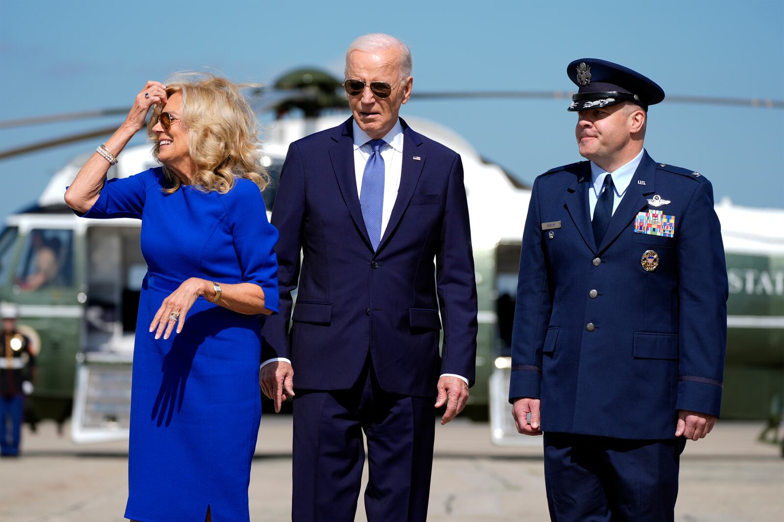 President Joe Biden and first lady Jill Biden walk to board Air Force One at Joint Base Andrews, Md., Saturday, Oct. 5, 2024, with Col. Paul Pawluk, Vice Commander of the 89th Airlift Wing. (AP Photo/Manuel Balce Ceneta)