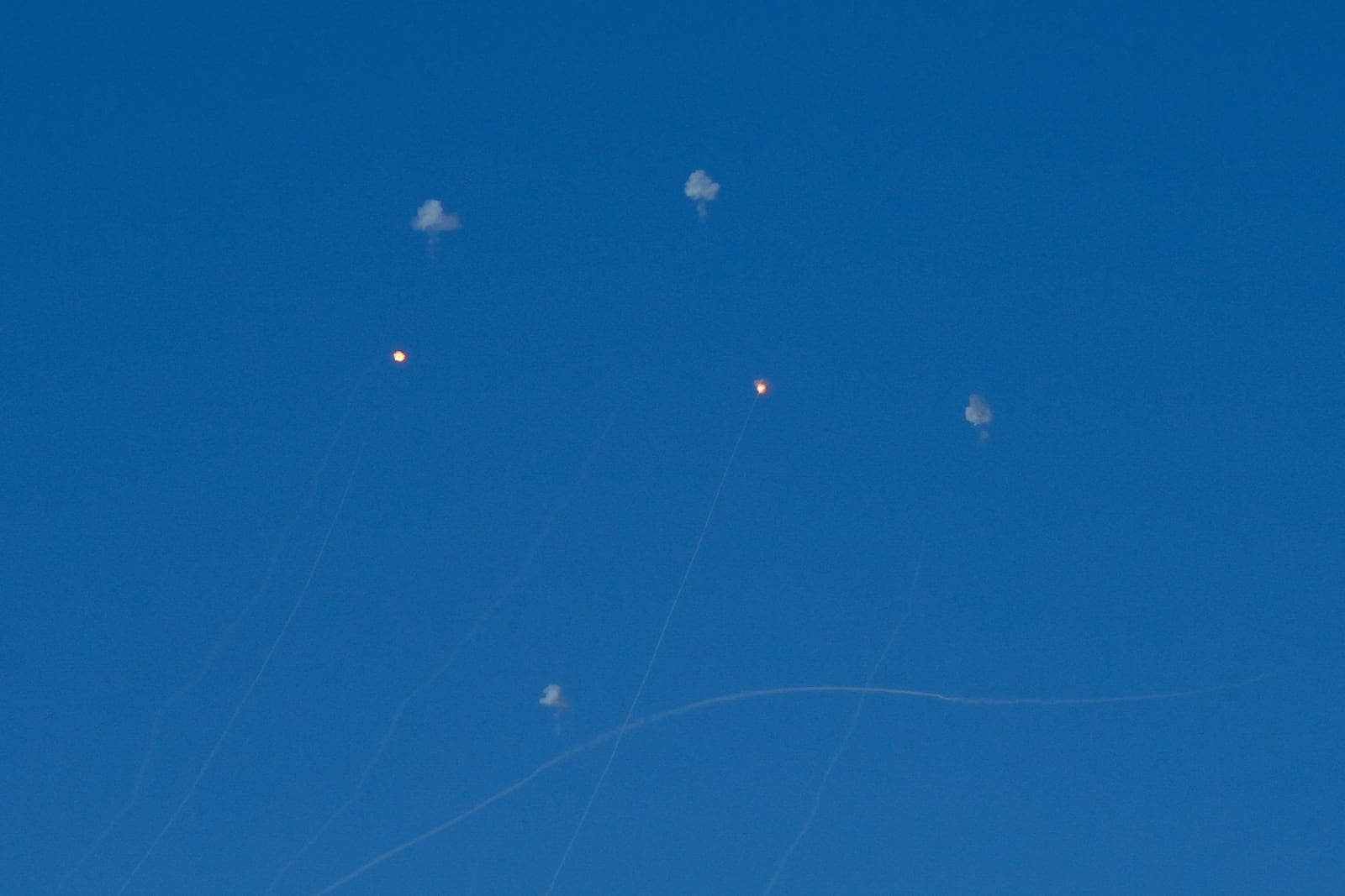 Israeli Iron Dome air defense system fires to intercept rockets that were launched from Lebanon, in northern Israel, Monday, Sept. 23, 2024. (AP Photo/Baz Ratner)