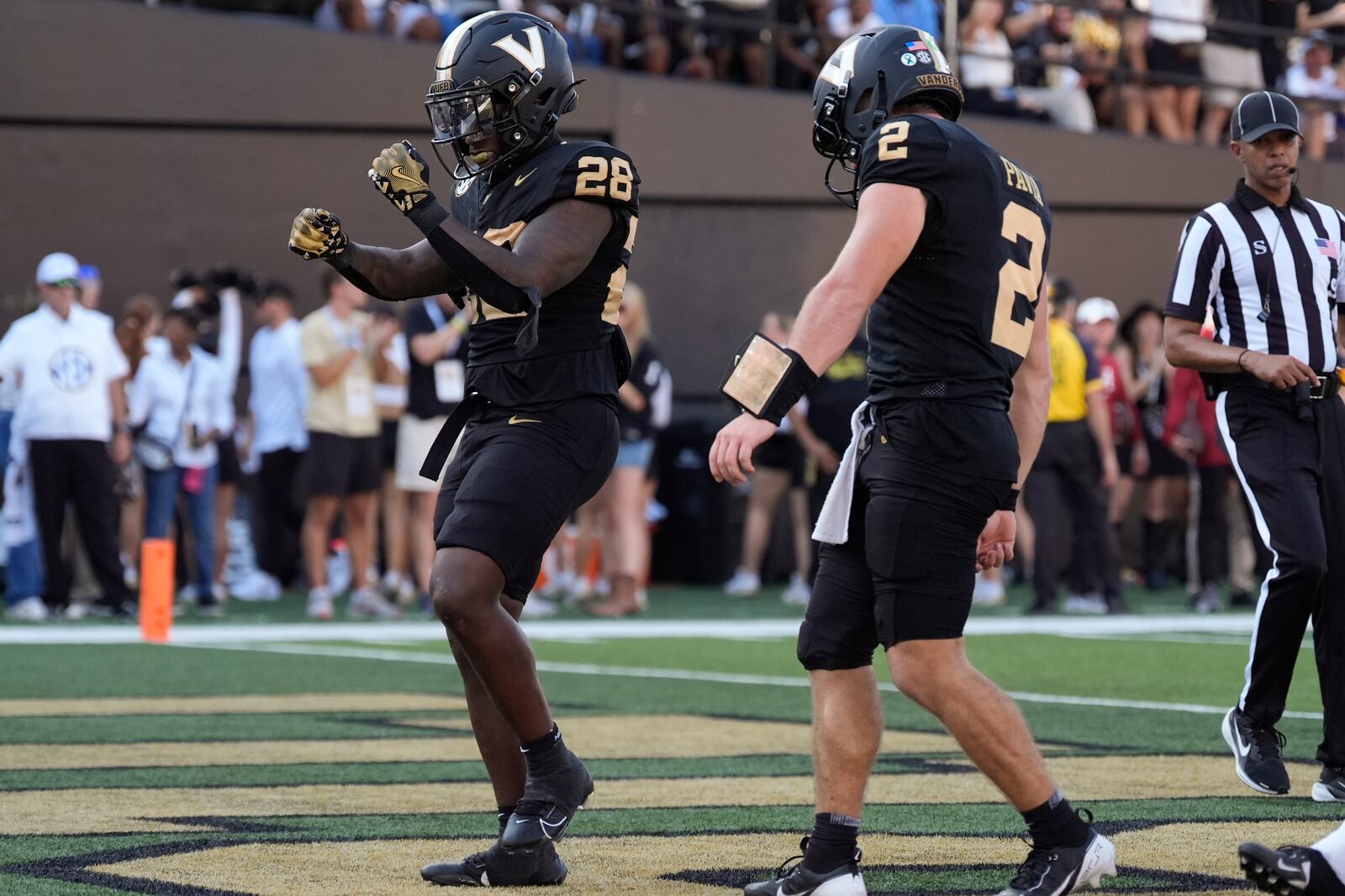 Vanderbilt running back Sedrick Alexander (28) celebrates a touchdown with quarterback Diego Pavia (2) during the first half of an NCAA college football game against Alabama, Saturday, Oct. 5, 2024, in Nashville, Tenn. (AP Photo/George Walker IV)