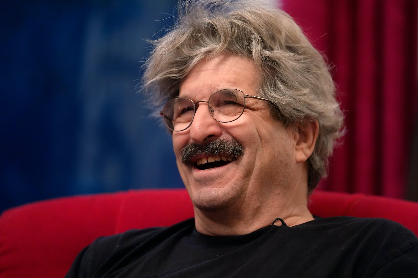 Gary Ruvkun, American molecular biologist, 2024 Nobel Prize winner in physiology or medicine, speaks with a reporter, Monday, Oct. 7, 2024, at his home, in Newton, Mass. (AP Photo/Steven Senne)