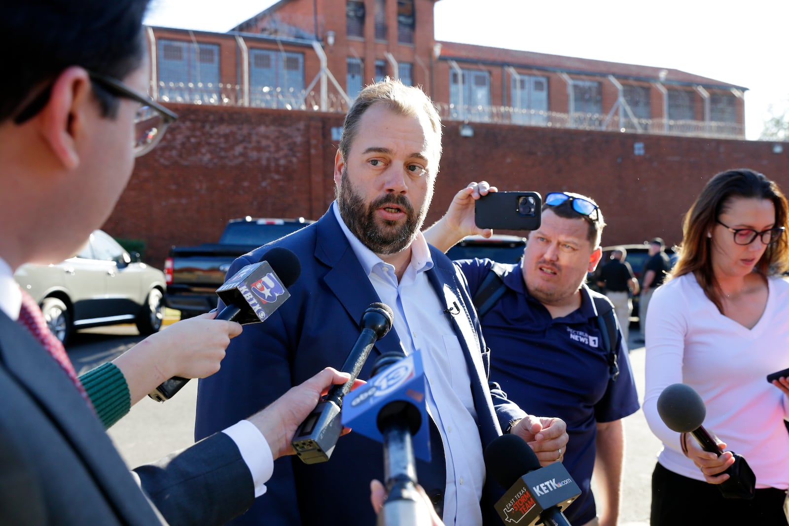 Texas State Rep. John Bucy III speaks to reporters on the pending execution of Robert Roberson during an impromptu press conference outside of the Huntsville Unit of the Texas State Penitentiary, Thursday, Oct. 17, 2024, in Huntsville, Texas. (AP Photo/Michael Wyke)