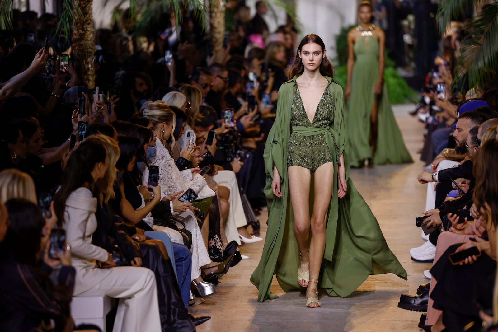 A model wears a creation as part of the Elie Saab Spring/Summer 2025 collection presented Saturday, Sept. 28, 2024, in Paris. (Photo by Vianney Le Caer/Invision/AP)