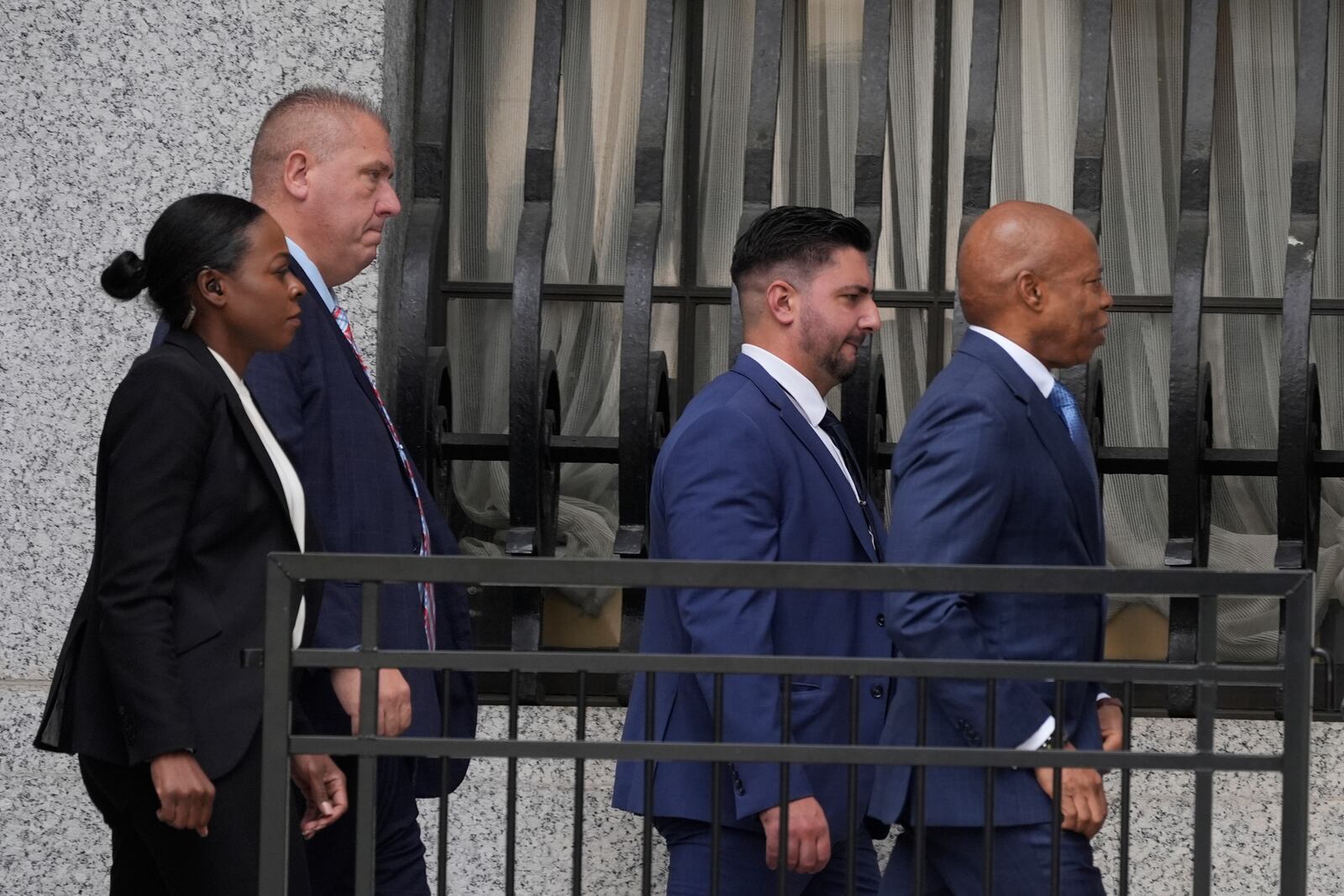 Eric Adams, right, walks into the federal courthouse n New York, Wednesday, Oct. 2, 2024. (AP Photo/Pamela Smith)