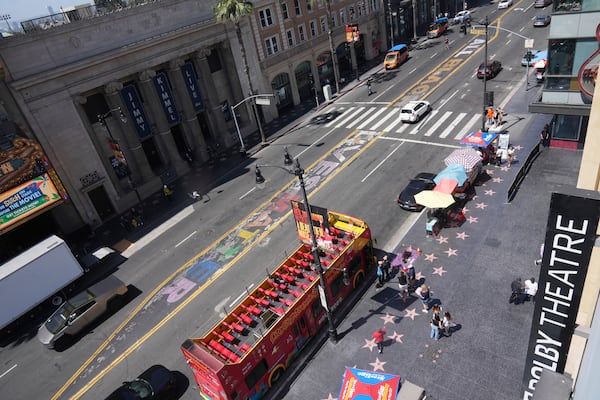 A sign reads "All Black Lives Matter" as part of an art installation Tuesday, May 20, 2025, in the Hollywood section of Los Angeles. (AP Photo/Damian Dovarganes)