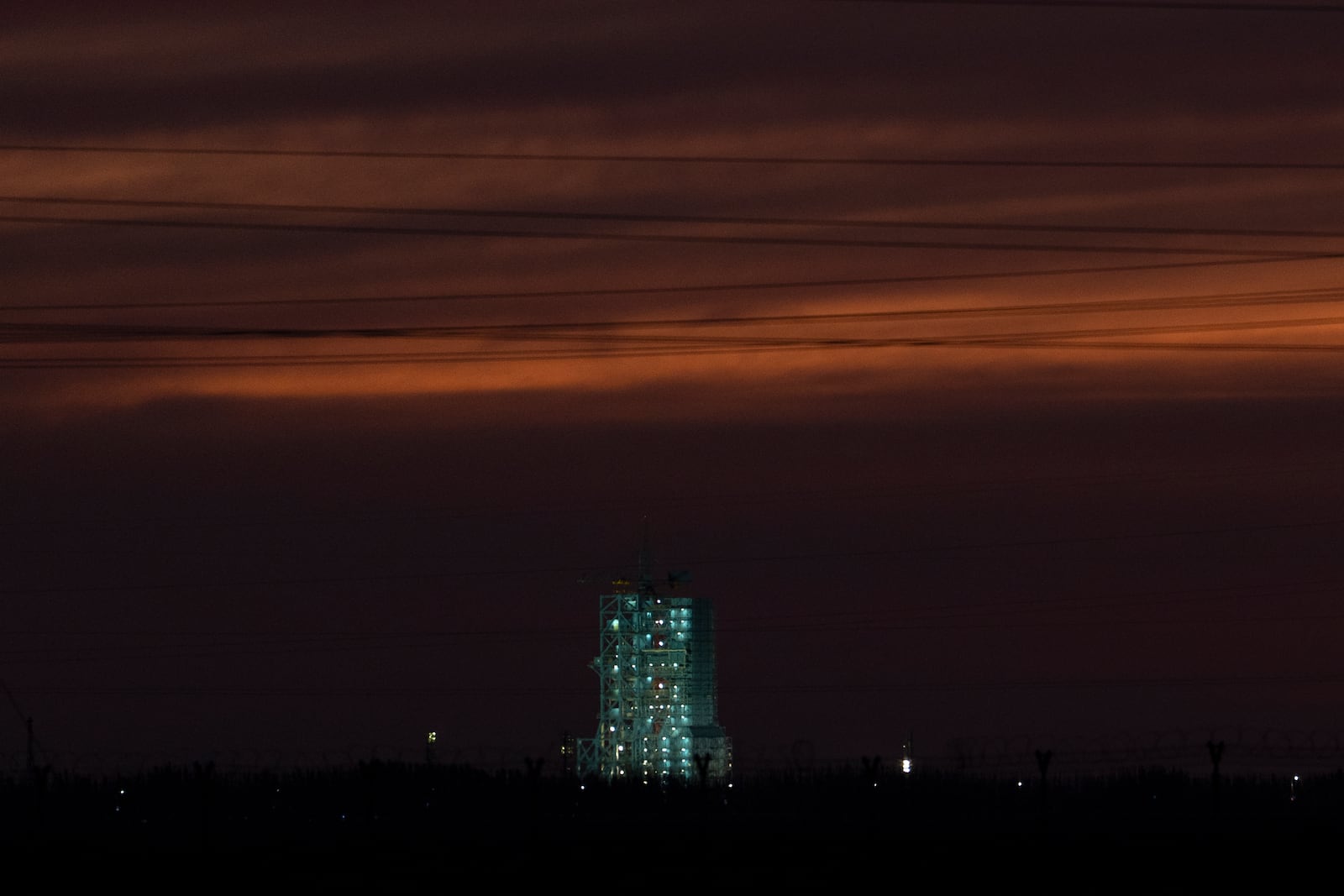 The launch pad for the Shenzhou-19 mission is seen during day break at the Jiuquan Satellite Launch Center in Jiuquan, northwest China Tuesday, Oct. 29, 2024. (AP Photo/Ng Han Guan)