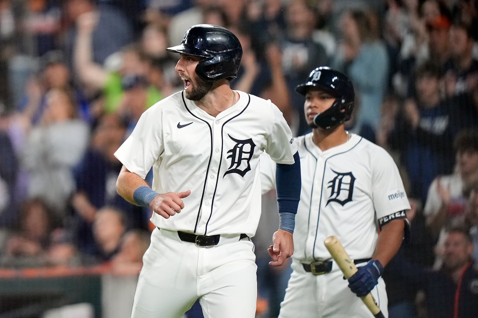 Detroit Tigers' Matt Vierling reacts after scoring during the seventh inning of a baseball game against the Chicago White Sox, Friday, Sept. 27, 2024, in Detroit. (AP Photo/Carlos Osorio)