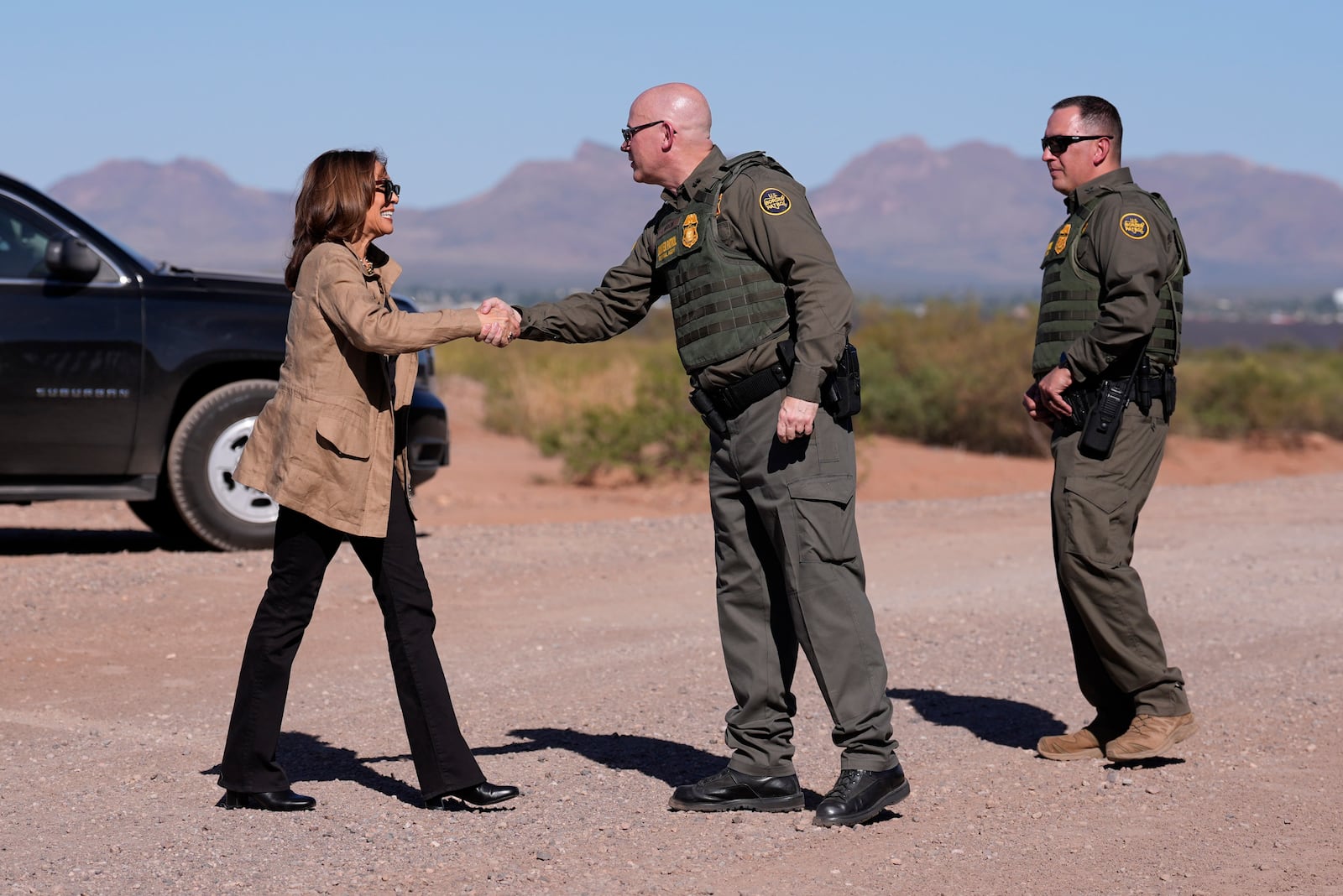 Democratic presidential nominee Vice President Kamala Harris greets members of the U.S. Border Patrol as she visits the U.S. border with Mexico in Douglas, Ariz., Friday, Sept. 27, 2024. (AP Photo/Carolyn Kaster)