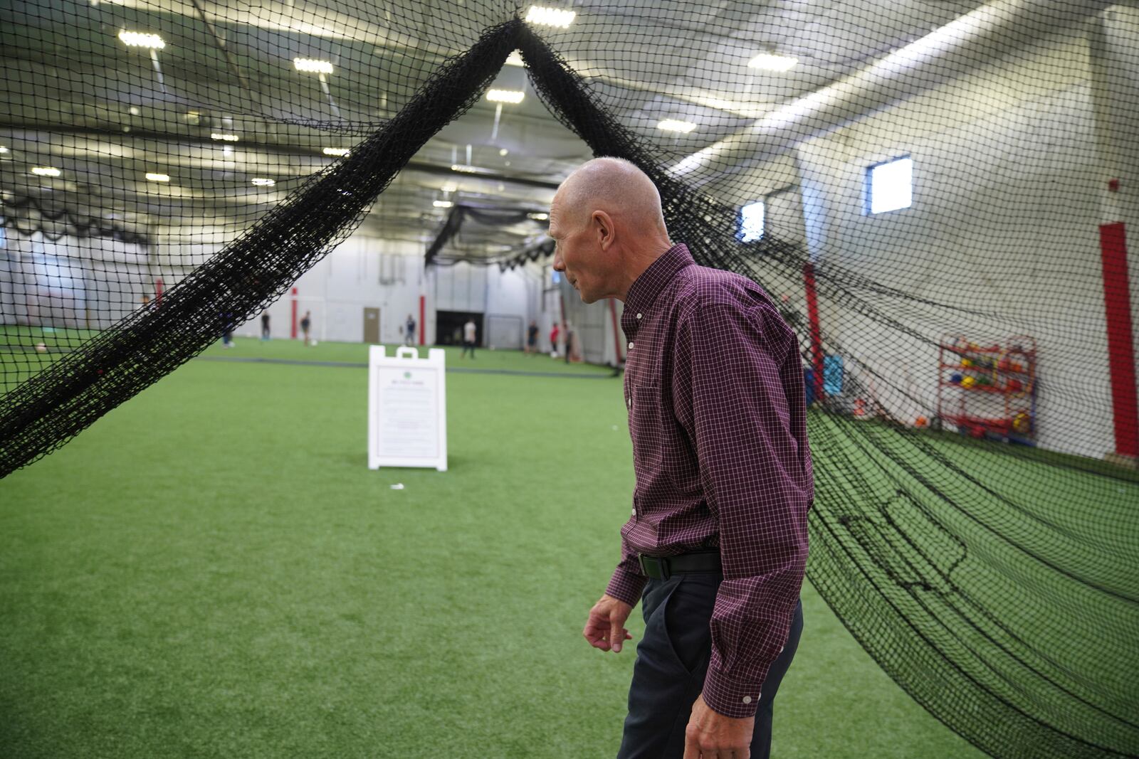 Steve Robinson, Worthington’s city administrator walks into the newly constructed JBS Fieldhouse on Monday, Oct. 21, 2024, in Worthington, Minn. (AP Photo/Jessie Wardarski)