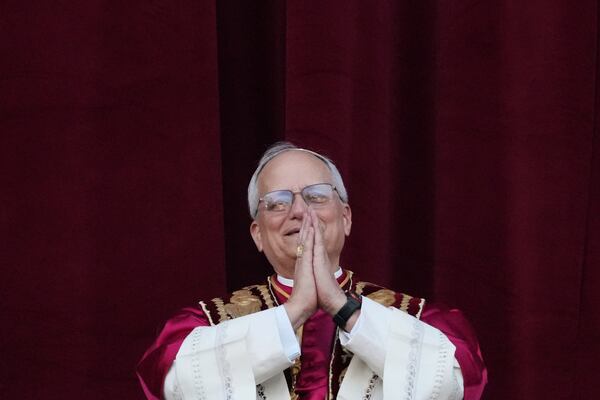 Newly elected Pope Leo XIV appears at the balcony of St. Peter's Basilica at the Vatican, Thursday, May 8, 2025. (AP Photo/Alessandra Tarantino)
