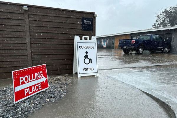 Voting signs are posted Saturday, May 3, 2025, outside a polling station in the town of Boca Chica, Texas, that would become Starbase, Texas, if local residents approve a measure to make the home of Elon Musk's SpaceX its own city. (AP Photo/Valerie Gonzalez)