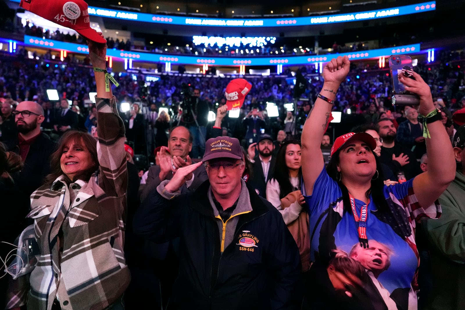 Attendees cheer at a campaign rally for Republican presidential nominee former President Donald Trump at Madison Square Garden, Sunday, Oct. 27, 2024, in New York. (AP Photo/Julia Demaree Nikhinson)