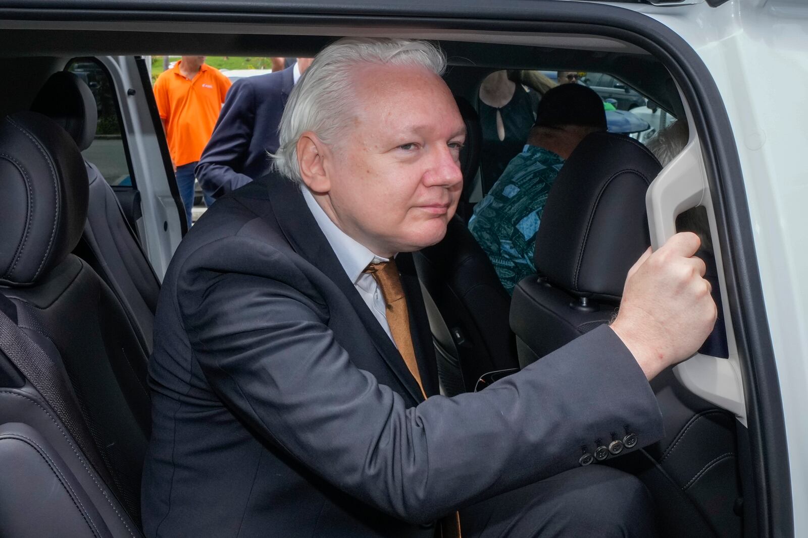 FILE - WikiLeaks founder Julian Assange leaves federal court in Saipan, Mariana Islands, June 26, 2024. (AP Photo/Eugene Hoshiko, File)