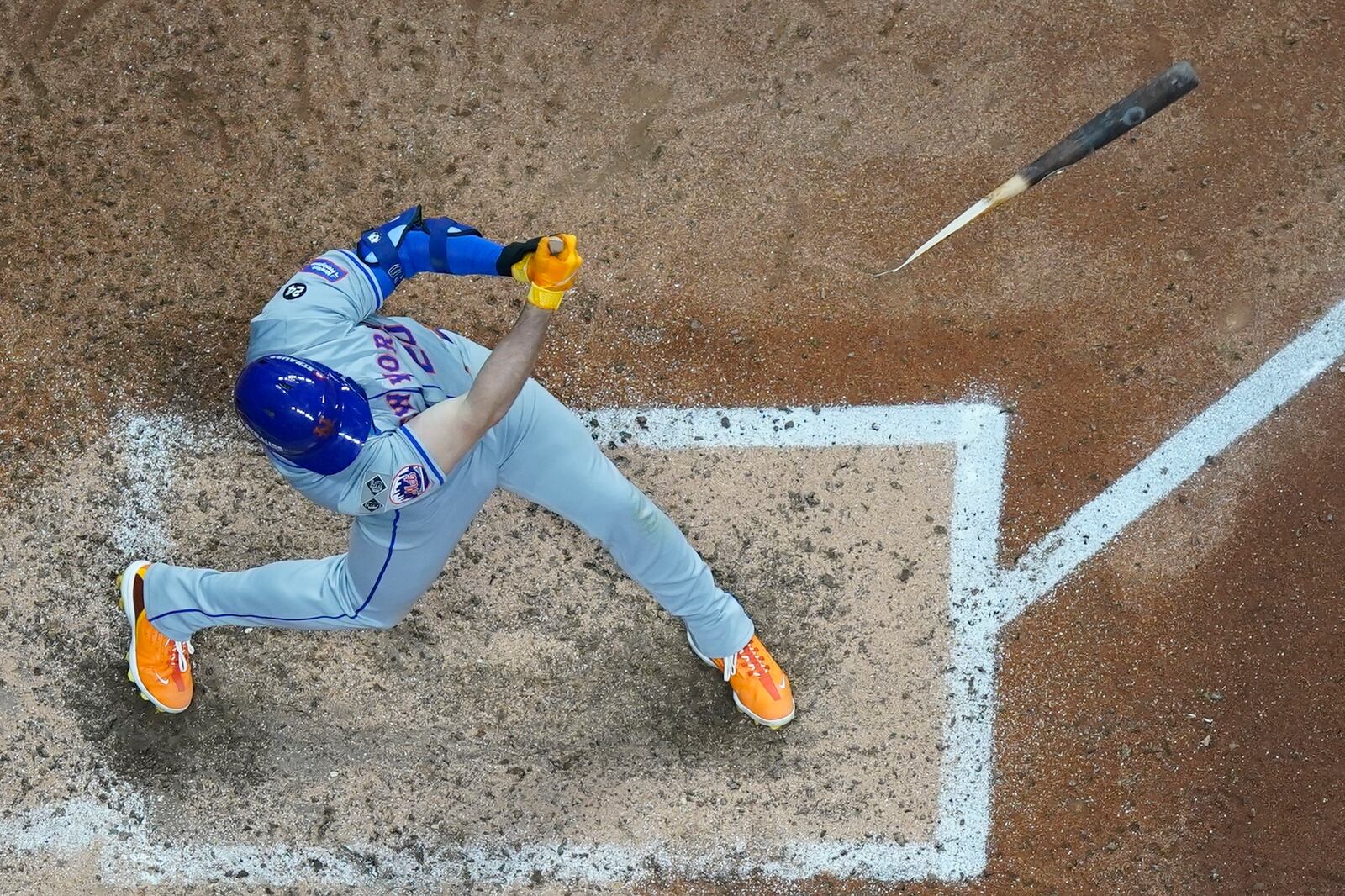 New York Mets' Pete Alonso hits a broken-bat single during the seventh inning of Game 2 of a National League wild card baseball game against the Milwaukee Brewers Wednesday, Oct. 2, 2024, in Milwaukee. (AP Photo/Morry Gash)