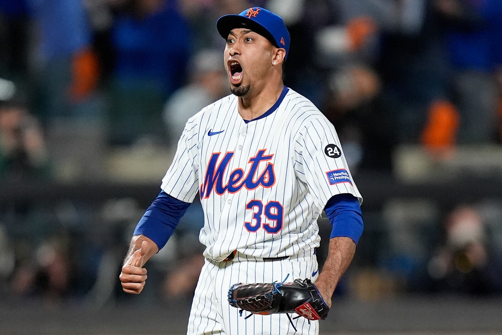 New York Mets pitcher Edwin Díaz (39) reacts after striking out the Philadelphia Phillies to end Game 4 of the National League baseball playoff series, Wednesday, Oct. 9, 2024, in New York. (AP Photo/Frank Franklin II)