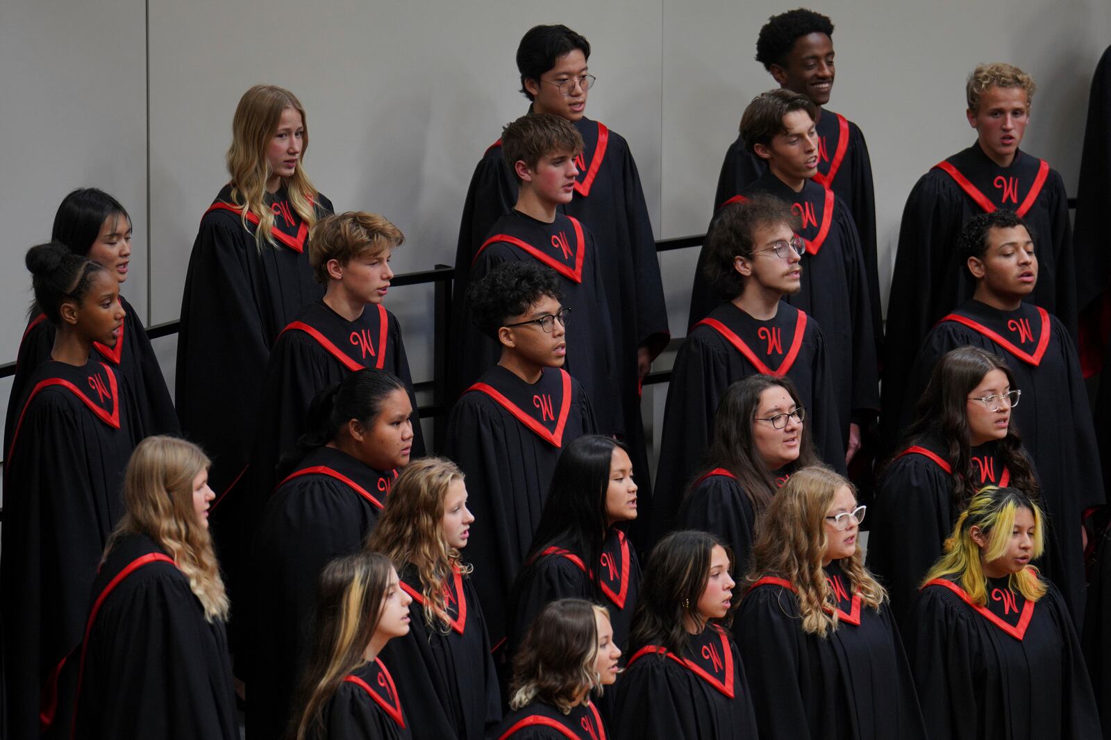 High school students perform in a choir concert at Worthington High School, in Worthington, Minn., on Monday, Oct. 21, 2024. (AP Photo/Jessie Wardarski)