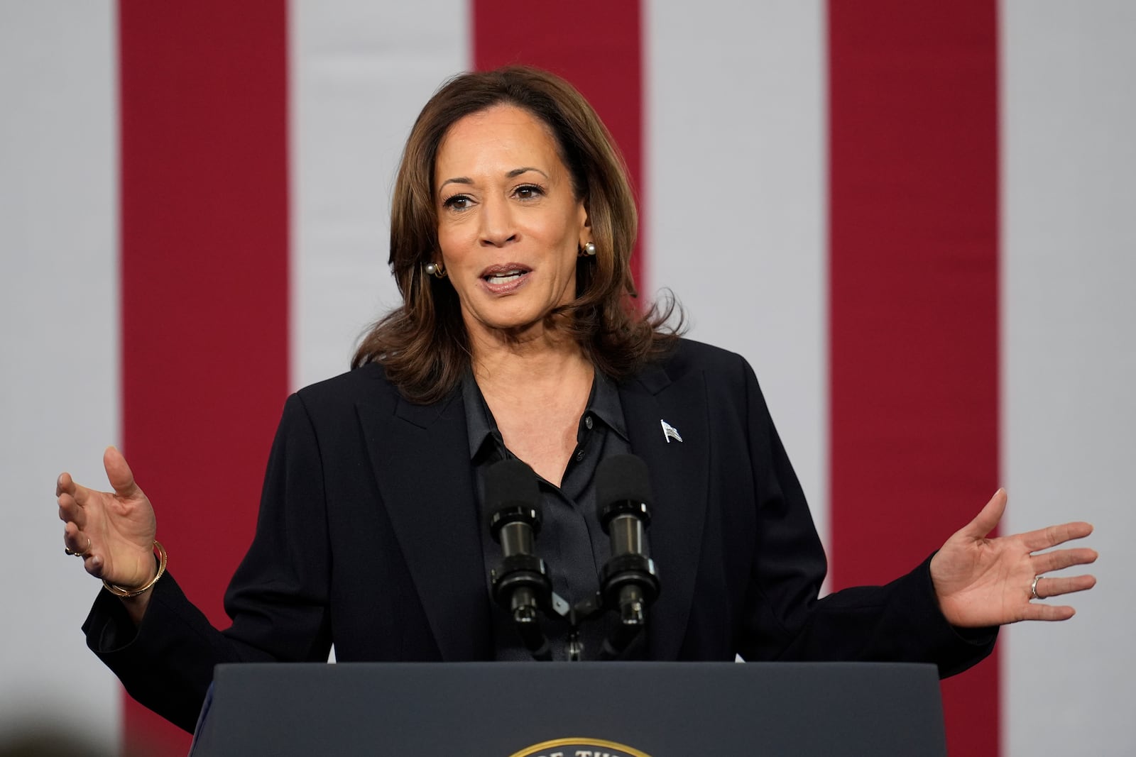 Democratic presidential nominee Vice President Kamala Harris speaks at the Redford Township Fire Department North Station, Friday, Oct. 4, 2024, in Redford Township, Mich. (AP Photo/Paul Sancya)