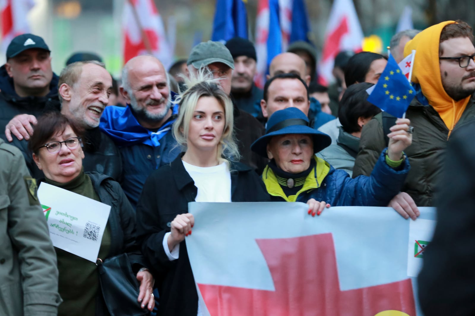 Protesters take part in a rally against alleged violations in a recent parliamentary election in Tbilisi, Georgia, Monday, Nov. 4, 2024. (AP Photo/Zurab Tsertsvadze)