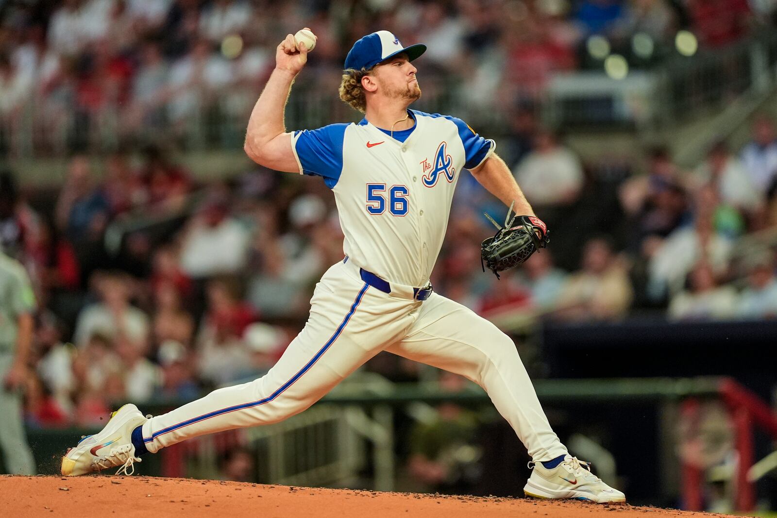 Atlanta Braves pitcher Spencer Schwellenbach (56) works against the Toronto Blue Jays in the third inning of a baseball game, Saturday, Sept. 7, 2024, in Atlanta.(AP Photo/Mike Stewart)