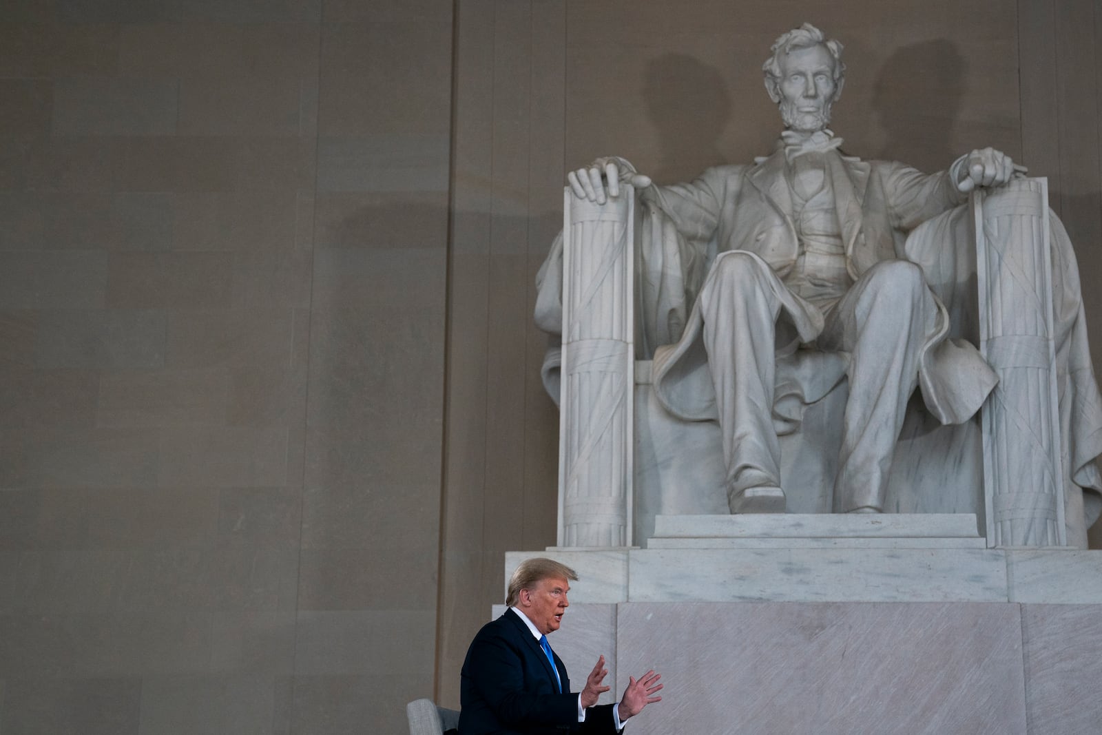 FILE - President Donald Trump speaks during a Fox News virtual town hall from the Lincoln Memorial, May 3, 2020, in Washington. (AP Photo/Evan Vucci, File)