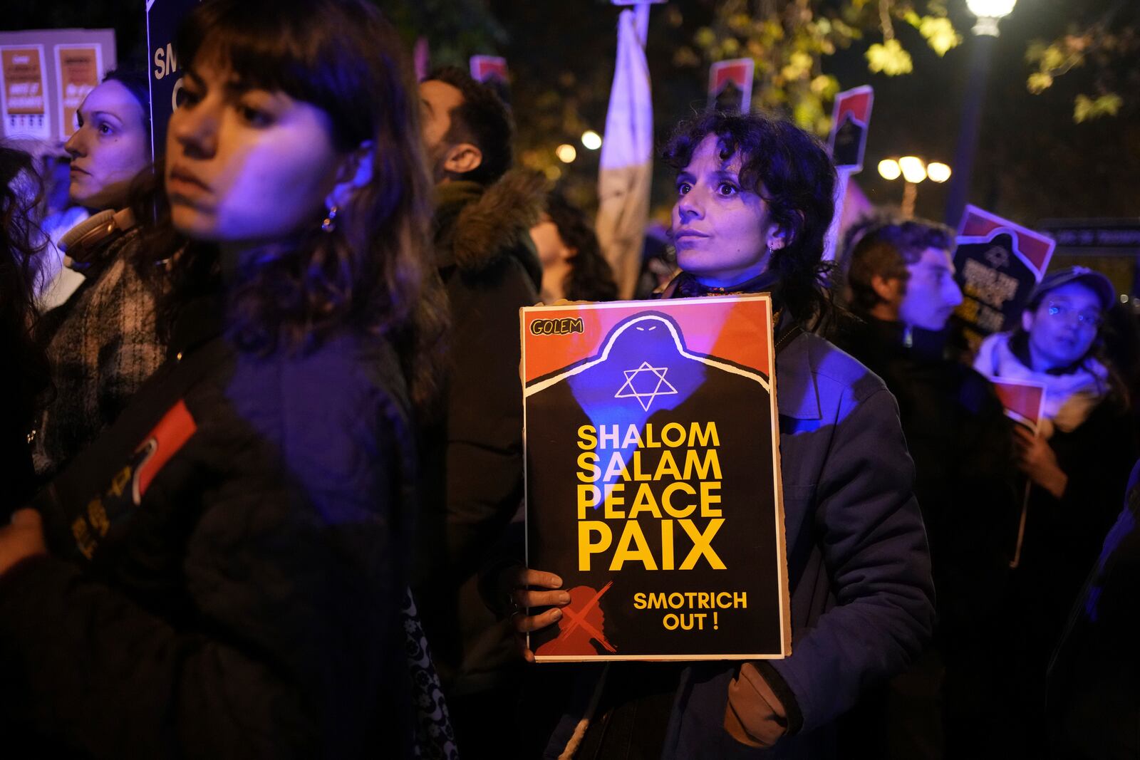 Protestors take part in a rally against the "Israel is Forever" gala organized by far-right Franco-Israeli figures, in Paris, Wednesday, Nov. 13, 2024, on the eve of the UEFA Nations League 2025 soccer match between France and Israel. (AP Photo/Christophe Ena)