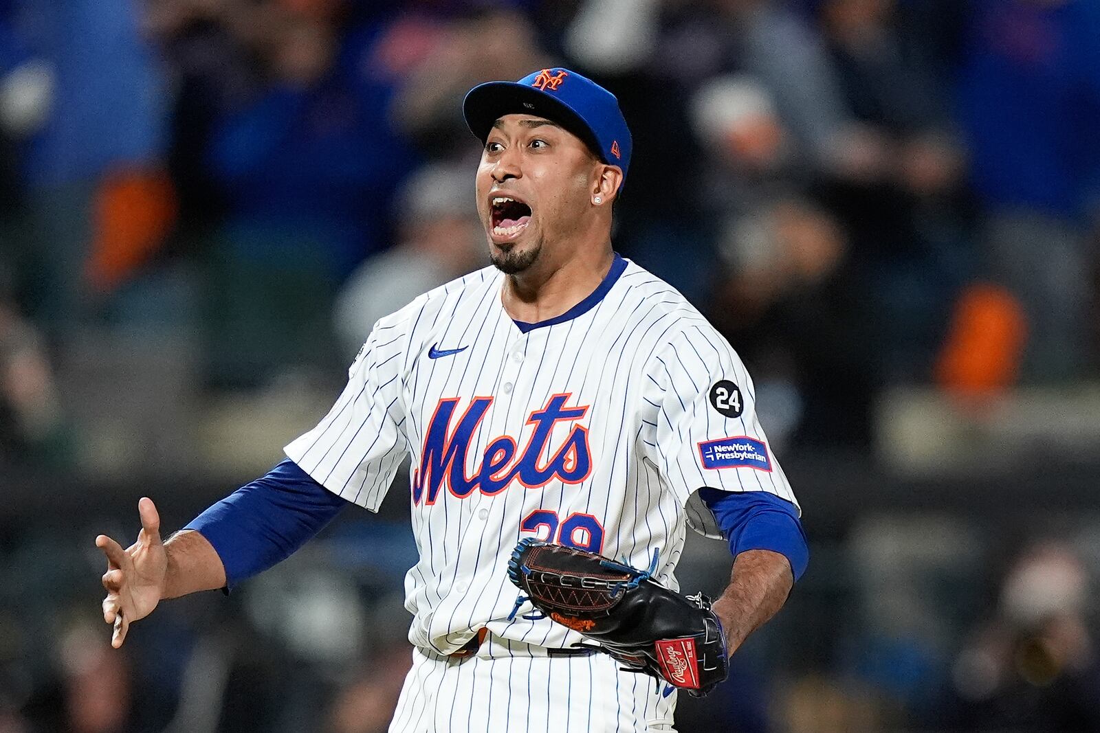 New York Mets pitcher Edwin Díaz (39) reacts after striking out the Philadelphia Phillies to end Game 4 of the National League baseball playoff series, Wednesday, Oct. 9, 2024, in New York. (AP Photo/Frank Franklin II)