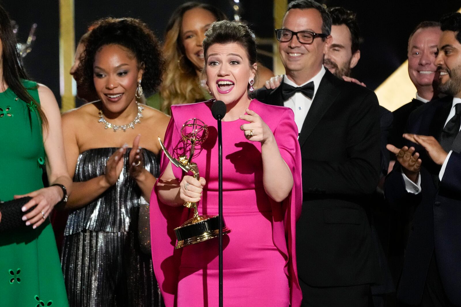 FILE - Kelly Clarkson, center, and the team from "The Kelly Clarkson Show" accept the award for outstanding daytime talk series during the 51st Daytime Emmy Awards on Friday, June 7, 2024, at the Westin Bonaventure in Los Angeles. (AP Photo/Chris Pizzello, File)